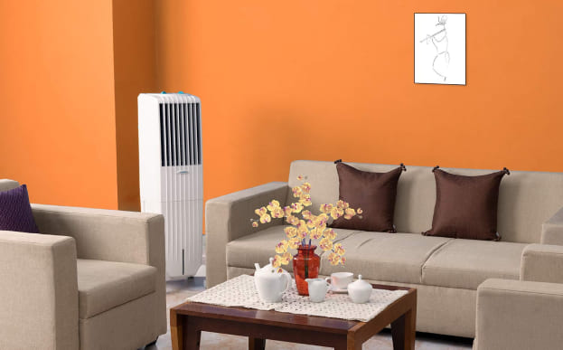 Foto ilustrativa do climatizador evaporativo sendo utilizado na sala de uma casa